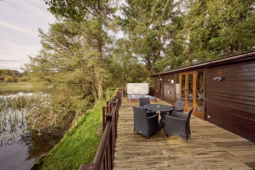 Thurstonfield House | Buzzard Lodge with Hot-tub