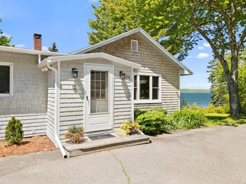 Trenton House | Charming home with stunning bay views, sunroom, gazebo, deck, & grill