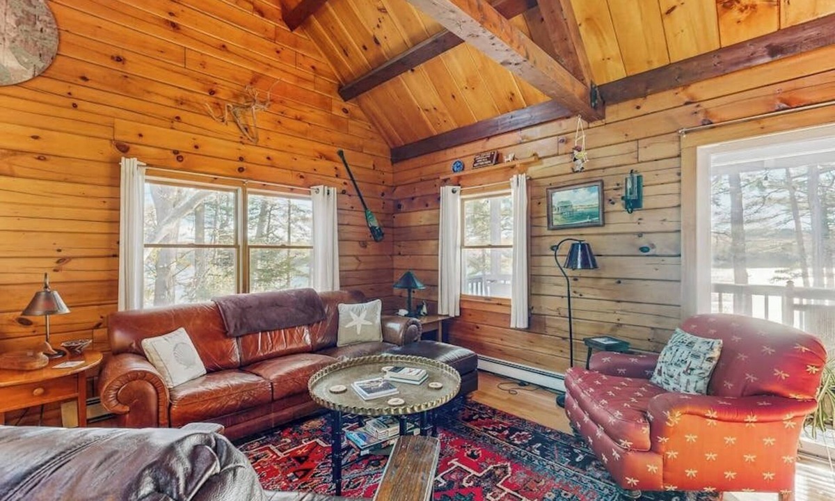 Wiscasset House | Charming riverfront home with cozy interiors, dock, and scenic deck views