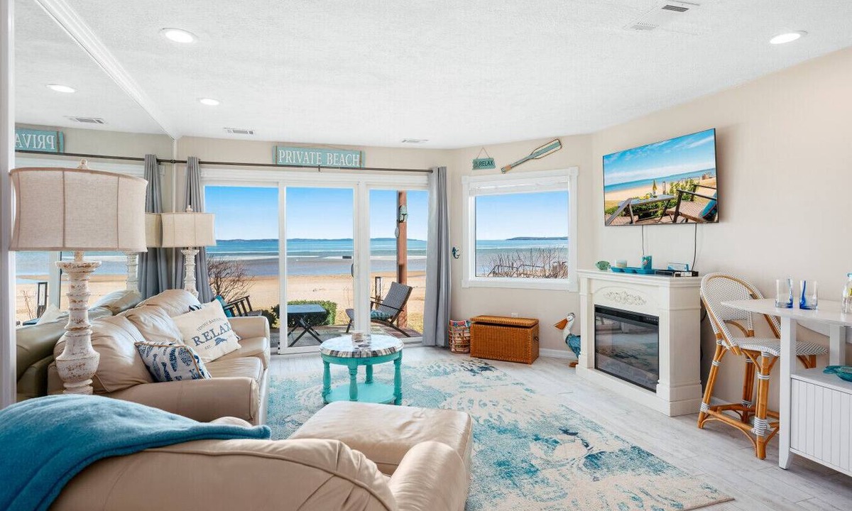 Traverse City Condo | Coastal Serenity 108 Beachfront Condo Near Downtown