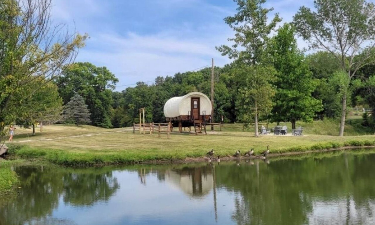 Andrew County RV Rental | Covered Western Style Wagon at AOK Campground up to 6 persons