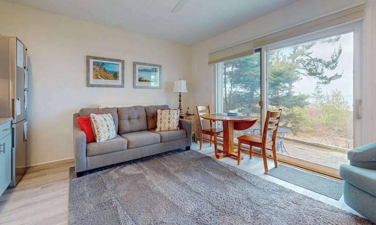 Glen Arbor Condo | Desirable beachfront condo in Glen Arbor with patio, fireplace, kitchenette & AC