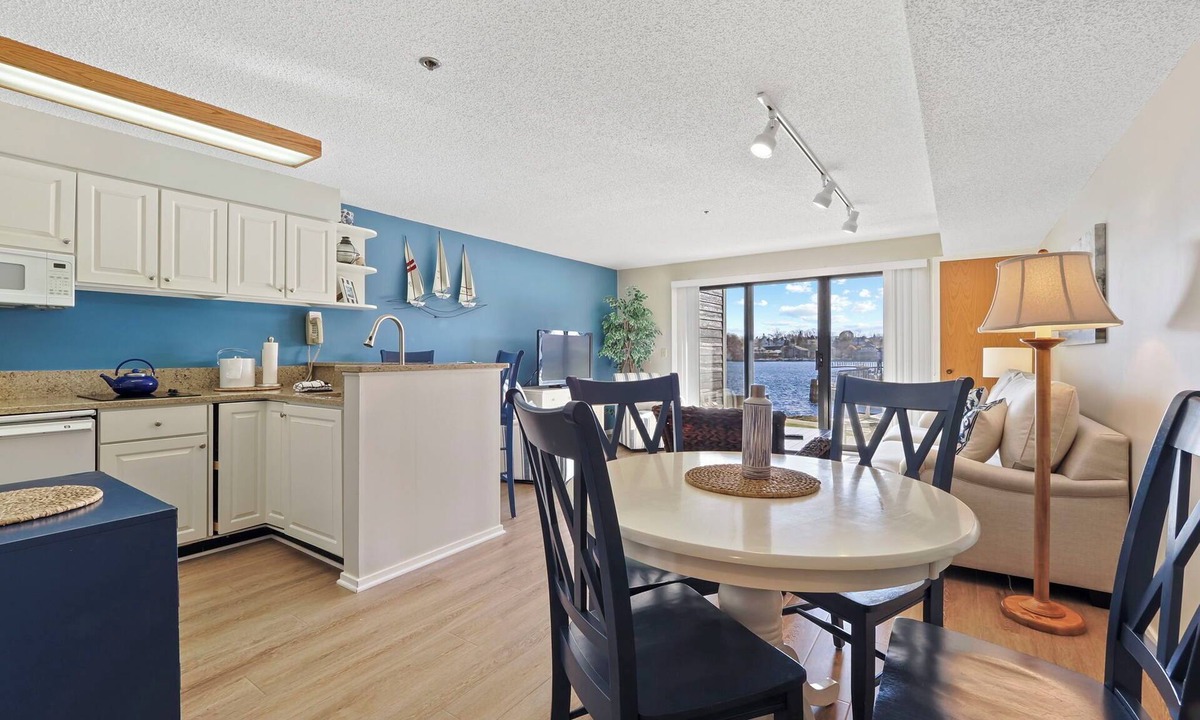 Charlevoix Condo | Edgewater Inn Condo #117D with Waterfront Access | Pool, Hot Tub, Sauna