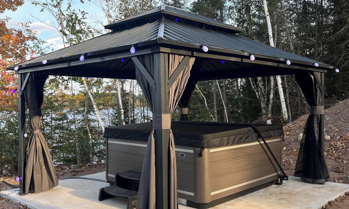 Oneida County Cabin | Escape to Lakeview Paradise, a luxury 4-bed, 3-bath lakefront retreat in Tripoli, WI. Each bedroom has a king bed, and the 2,560 sq. ft. home features high-end finishes, cozy comforts, and stunning lake views from a private 24-ft deck or hot tub.