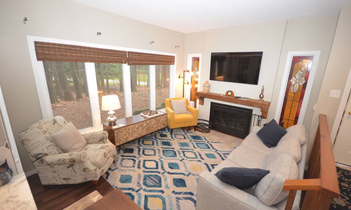 Maple City Condo | Glen Arbor condo in the woods w/screened porch, A/C, washer/dryer