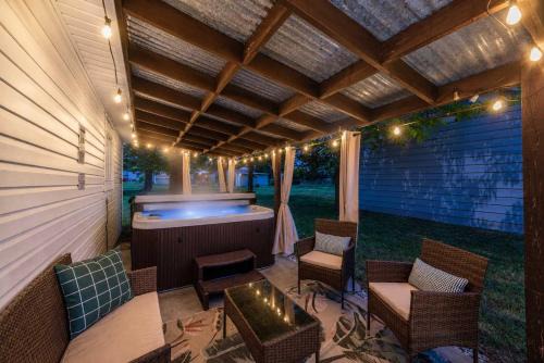 Parma Heights House | Hot Tub Game Room with Shuffleboard N64 Sleeps 8