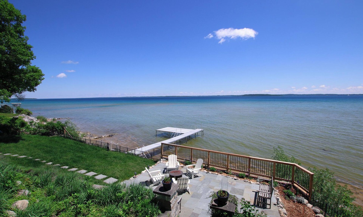 Traverse City House | Hot Tub & West Bay Waterfront Sunrises - All Decked Out