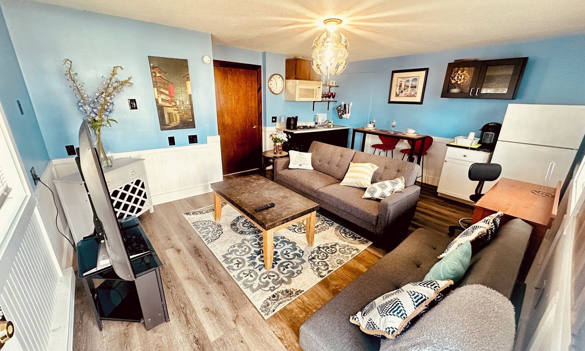 Biddeford Apartment | House dwelling that combines The bedroom kitchen and living area into one space