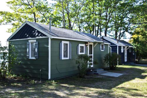 Carp Lake House | Incredible Cabin with Barbecue and Lake Access in Carp Lake, Michigan