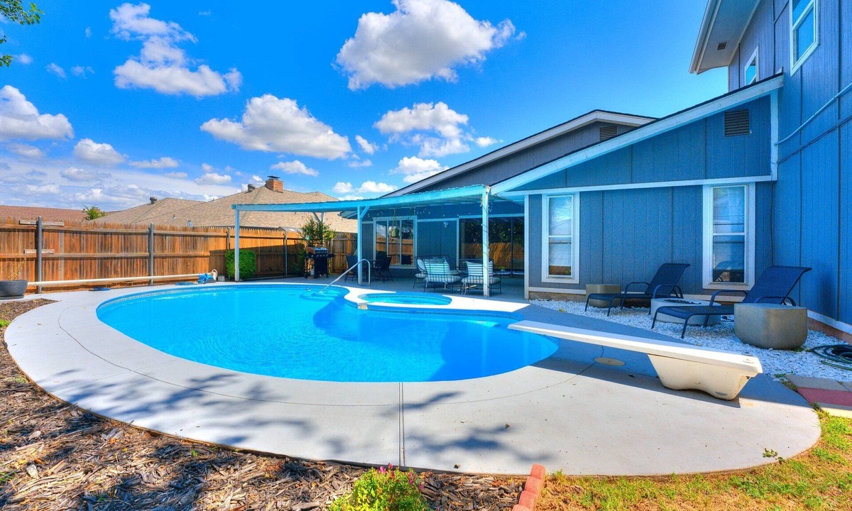 Oklahoma City House | Indigo & Cedar | 4BR | Pool + Gym + Game Room