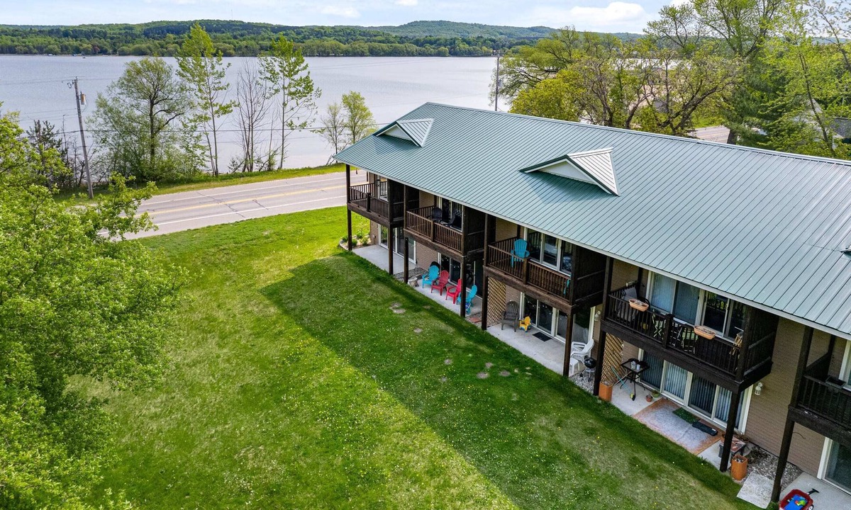 East Jordan Condo | Lake Charlevoix 2BR/3BA Townhome with Lake Views