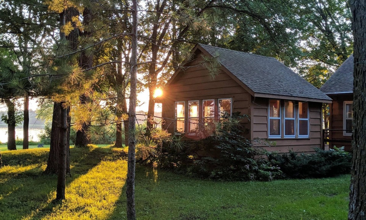 Darwin Cabin | Lake Stella beautiful beach and spacious deck on quiet private drive.