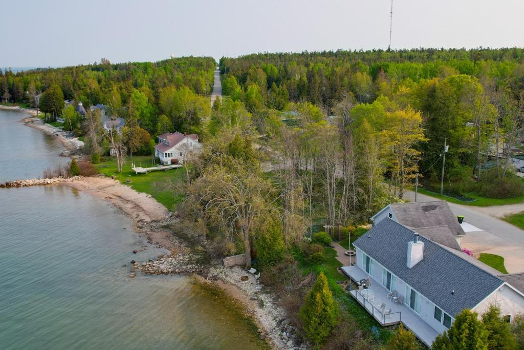 De Tour Village House | Lakefront De Tour Village Home w/Deck & Fire Pit!