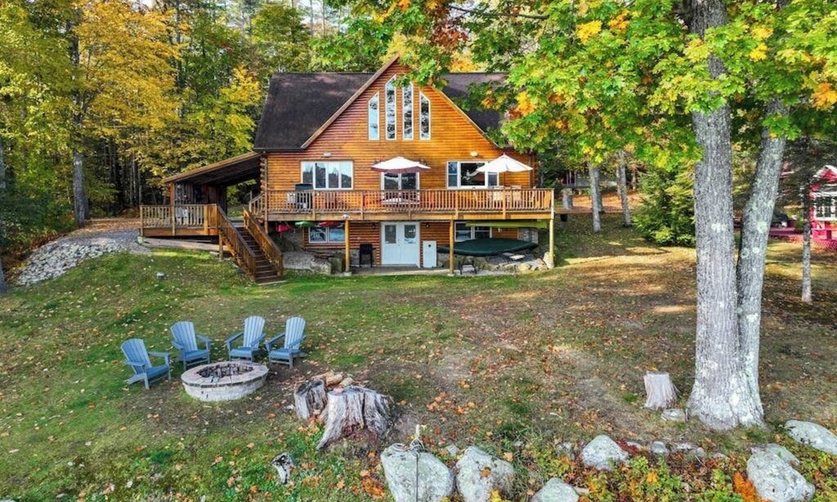 Norway House | Lakefront, dog-friendly home with dock, kayaks, SUPs, canoe, huge deck & firepit