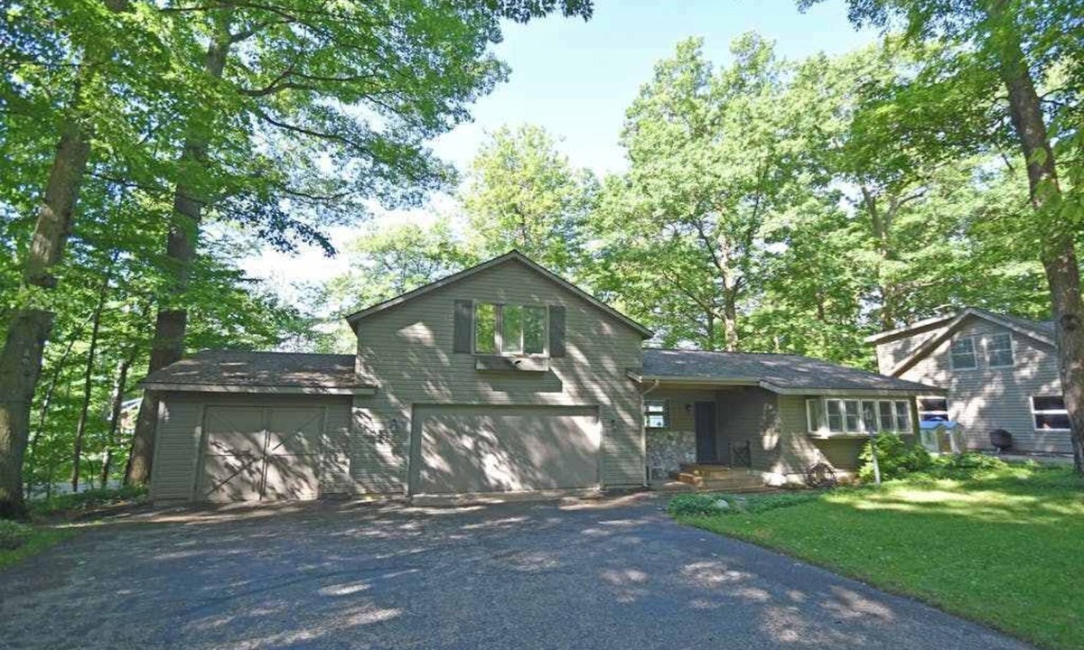 Empire House | Lakefront home on Little Glen Lake with fireplace, deck, gas grill, and firepit
