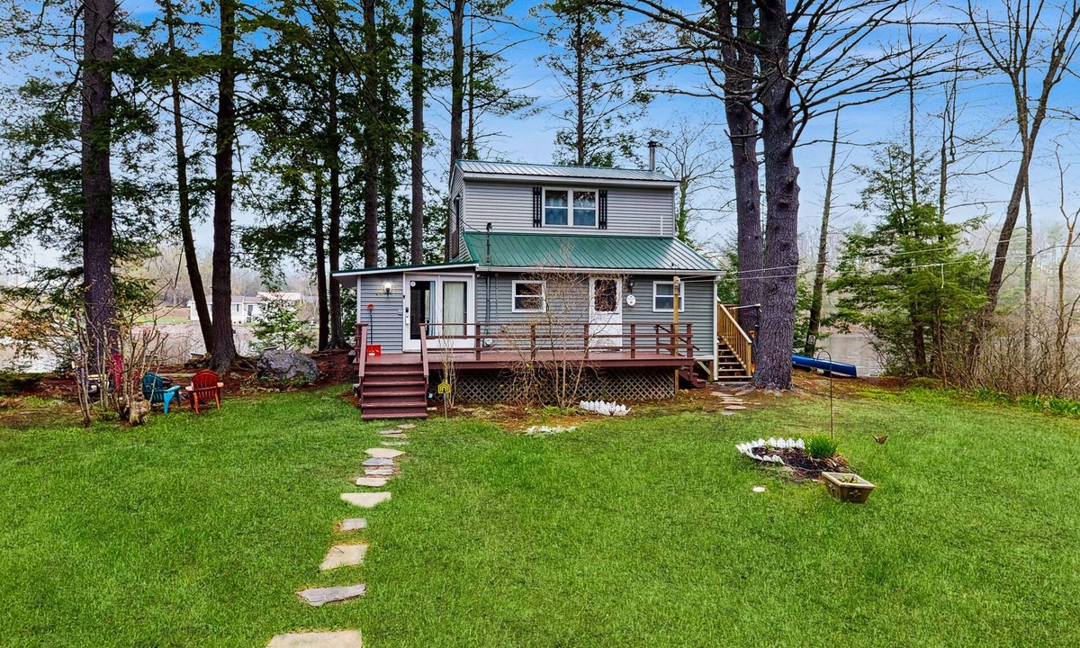 Augusta Cottage | Lakefront Home on Togus Pond with 2 Decks, Great View & Canoe/Fire Pit