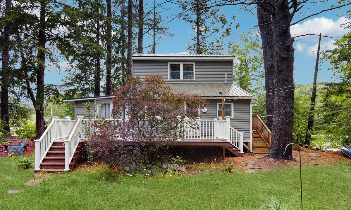 Augusta Cottage | Lakefront Home on Togus Pond with 2 Decks, Great View & Canoe/Fire Pit