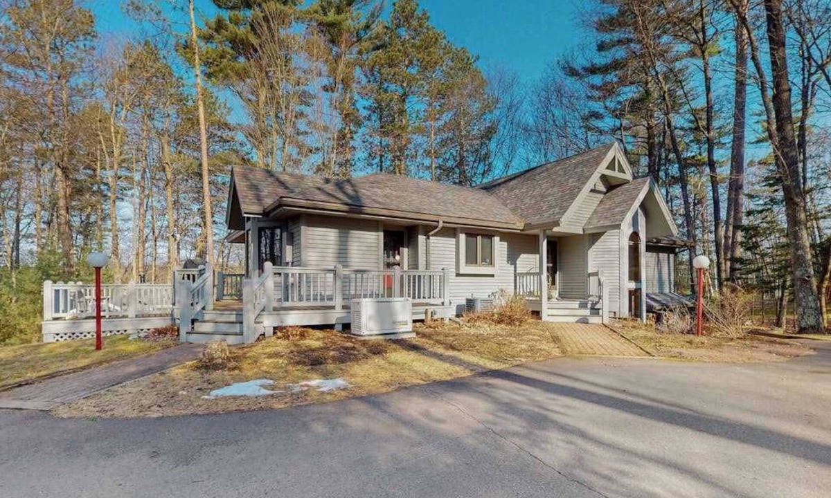 Hazelhurst House | Lakefront home with private outdoor sauna, dock, firepit, wood fireplace & patio