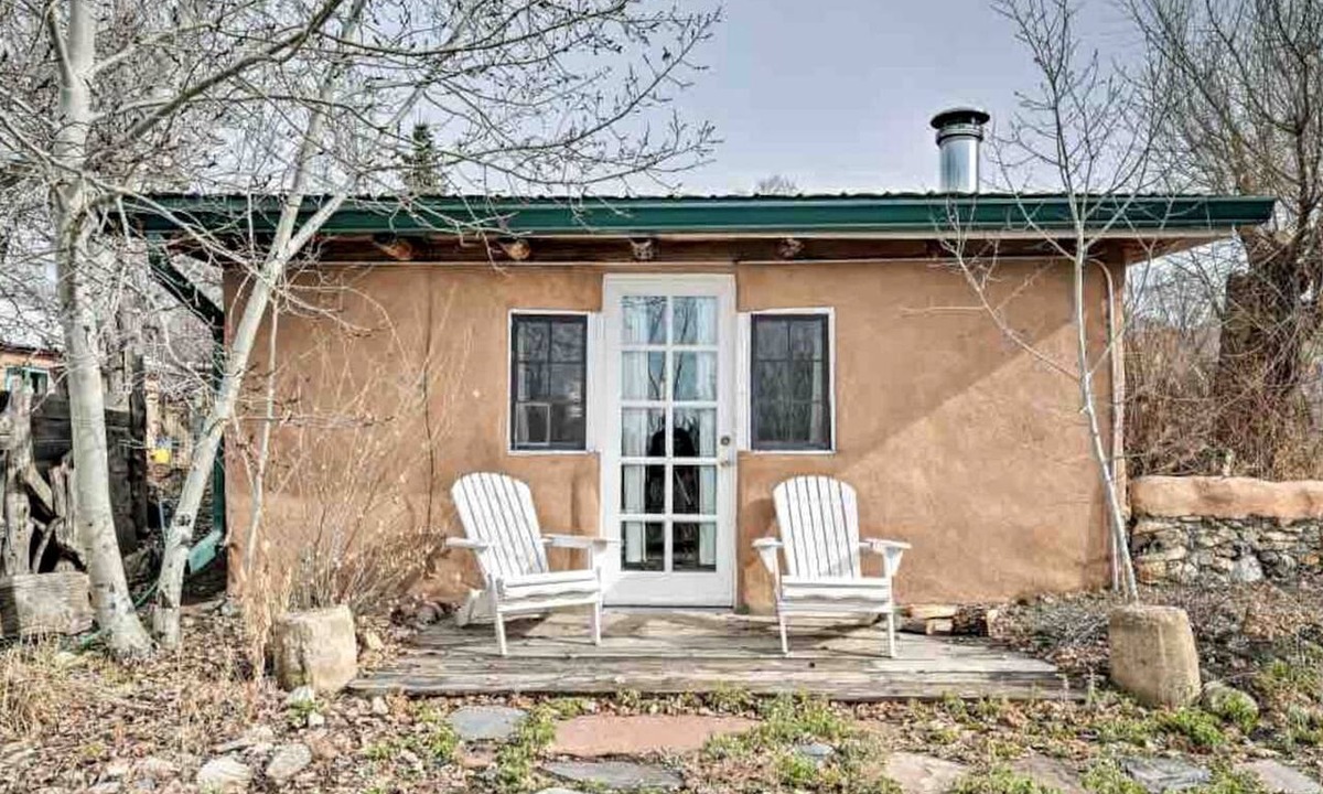 San Cristobal Cabin | Log Casita Overlooking Pond and Waterfall near Taos, New Mexico