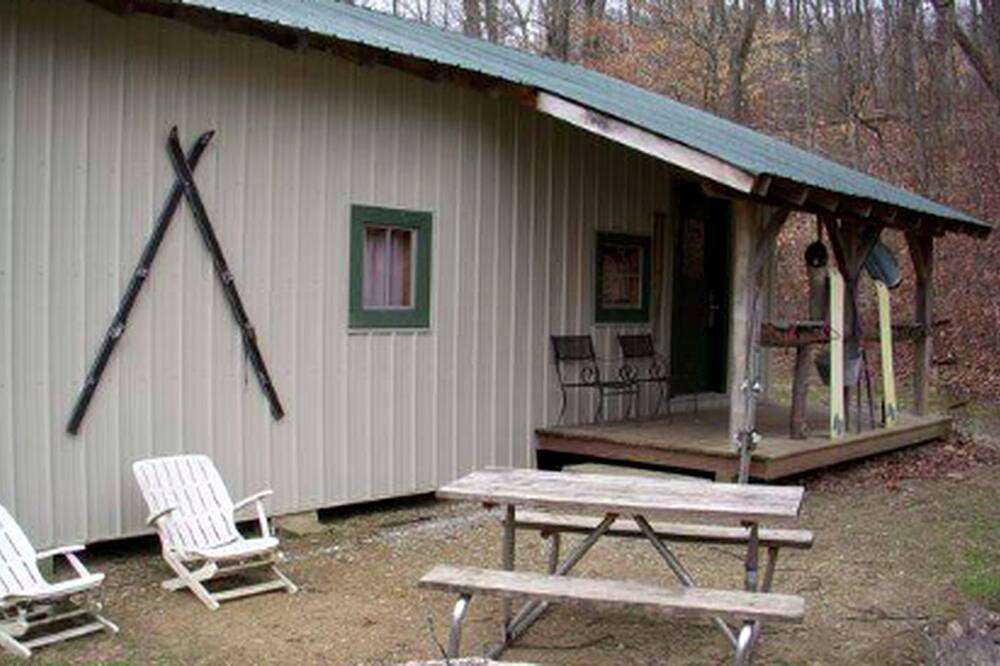Gnaw Bone Cabin | Luminous Cabin Nestled Among Nature in Indiana