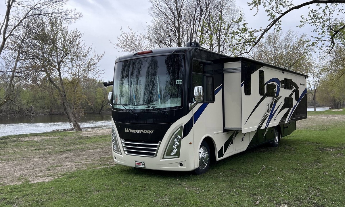 Walker House | Luxury RV with Bunkbeds Stationed on serene Grand River with private golf course
