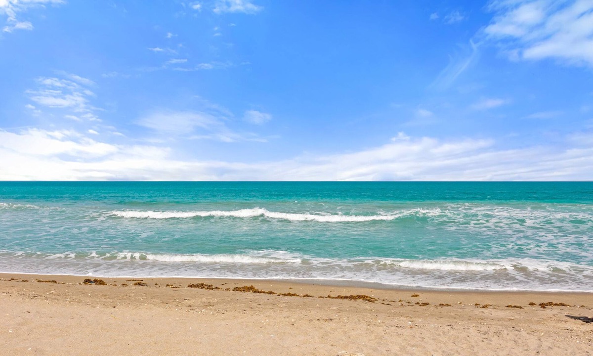 Hutchinson Island South Condo | Promotion: Updated ground floor unit just steps away from the beach