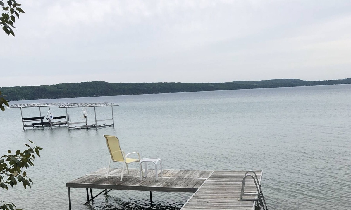 Frankfort Cottage | Quaint cottage on Crystal Lake with 100ft of private, sandy beach frontage.
