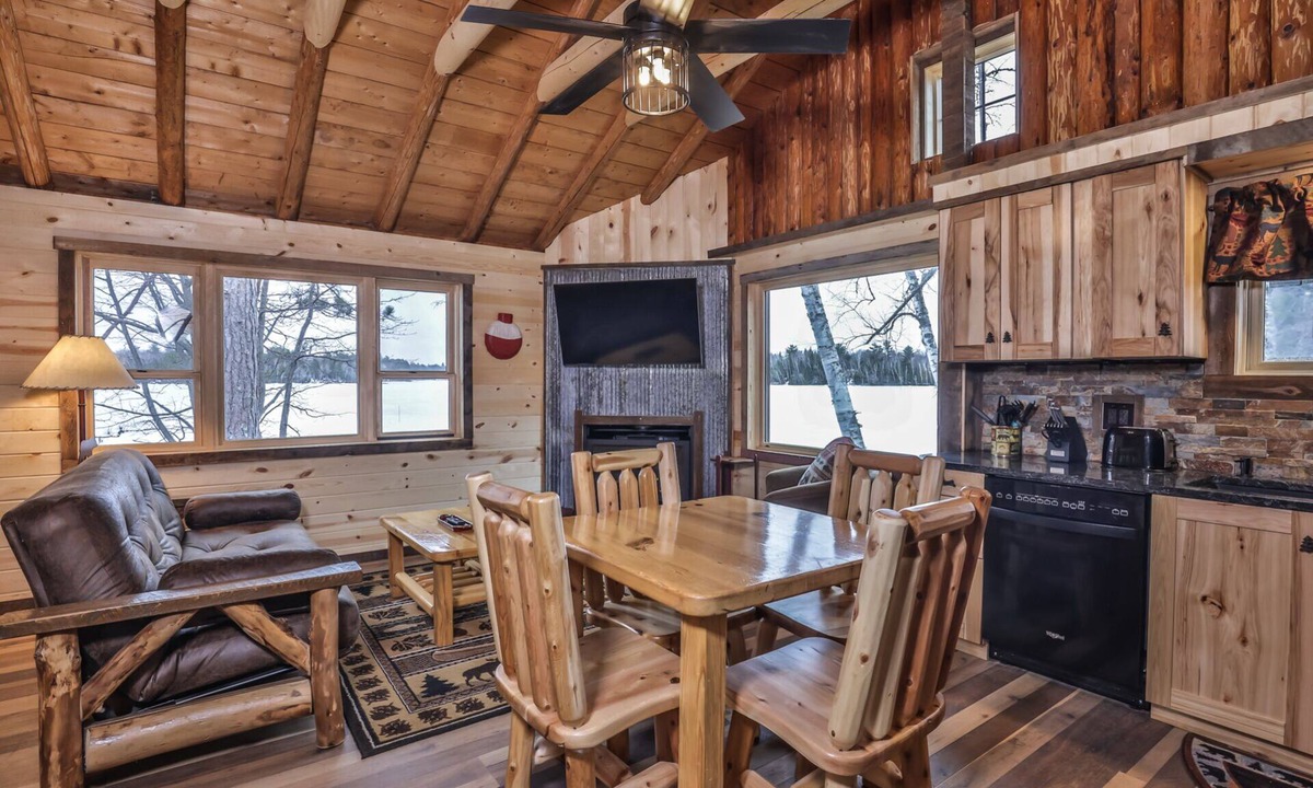 St Germain House | Remodeled lakeside resort cabin with fireplace, sandy beach, dock, firepit!