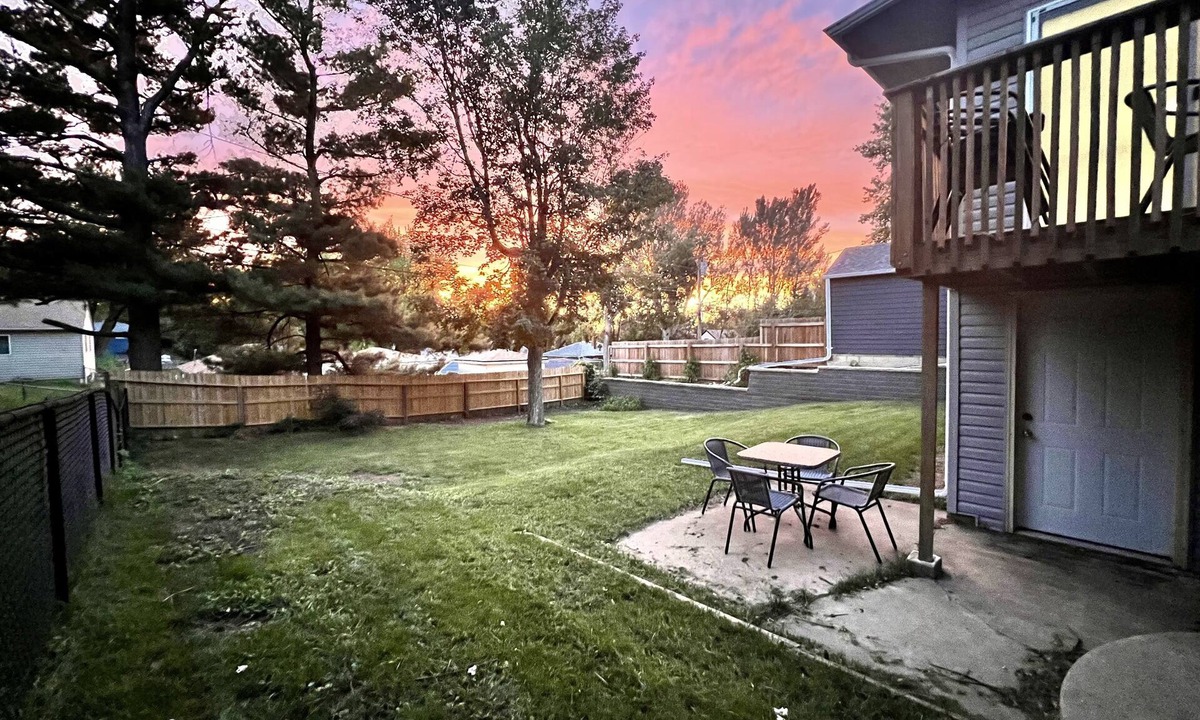 Sioux Falls House | Spacious 4-BR, 2.5 Bath vacation home: Foosball, 65" TV, Golf, 4 Season Room