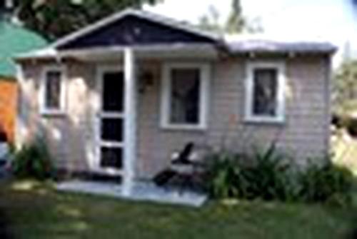 Carp Lake House | Stunning Cabin with Lake Access and Barbecue in Carp Lake, Michigan