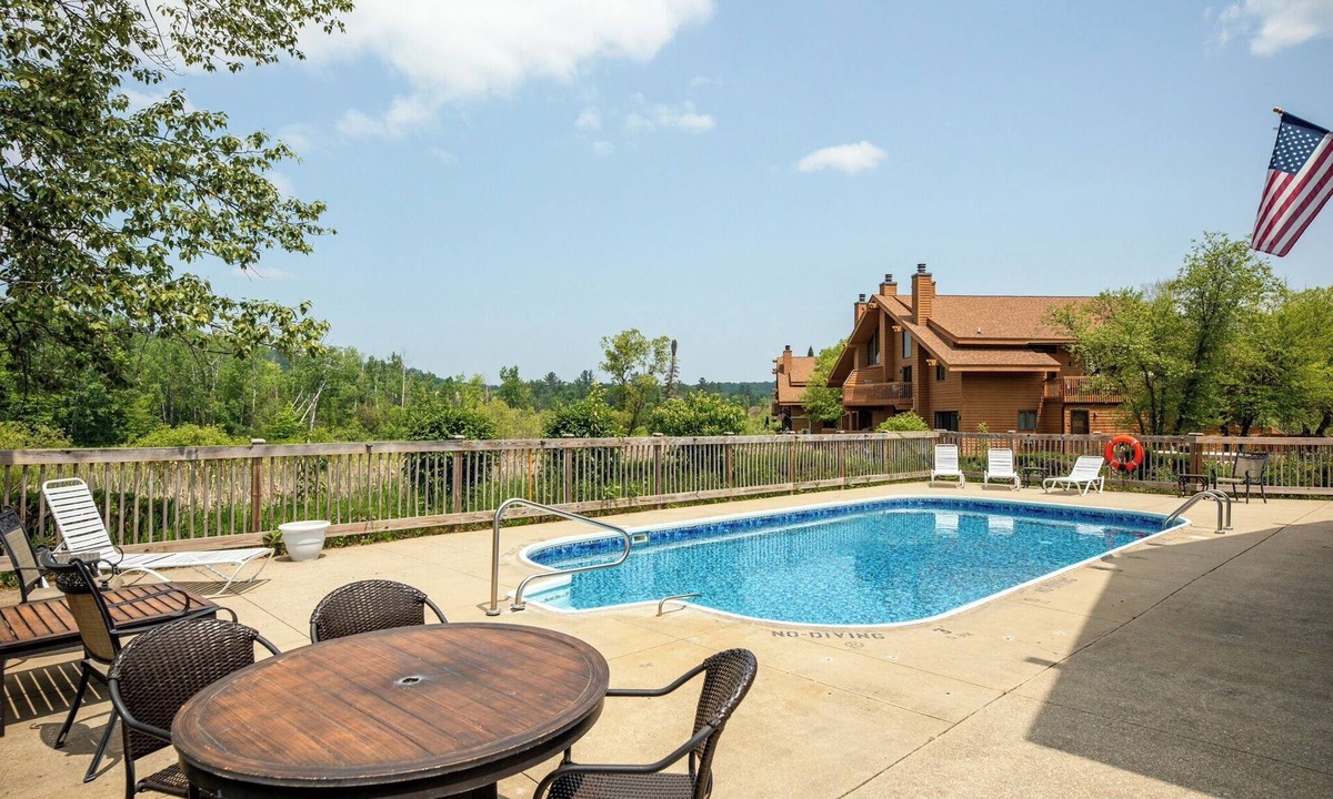 Bellaire Condo | Summer fun! Close to lakes, sleeps 6, 2 bath. Outdoor and indoor pools.