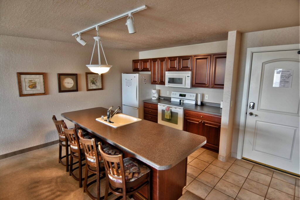 Birchwood Condo | T303 Beautiful condo on Tagalong Golf Course overlooking Red Cedar lake