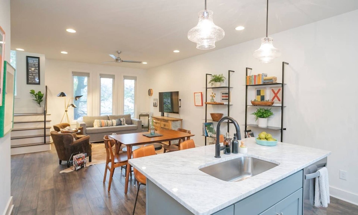 Katie Hill Neighborhood House | Townhome with Balcony Suites & Garage