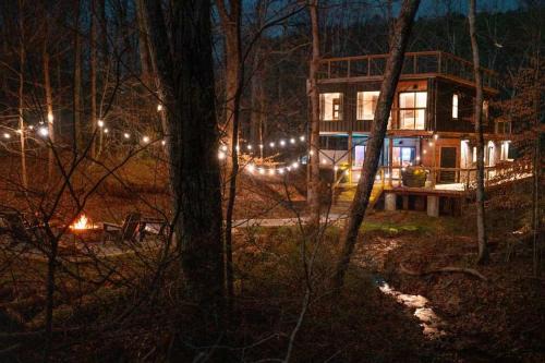 McArthur House | Unique Container Retreat with Creek Villa