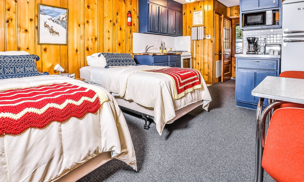 Presque Isle House | Vintage waterfront suite on South Turtle Lake with on-site dock & rowboats