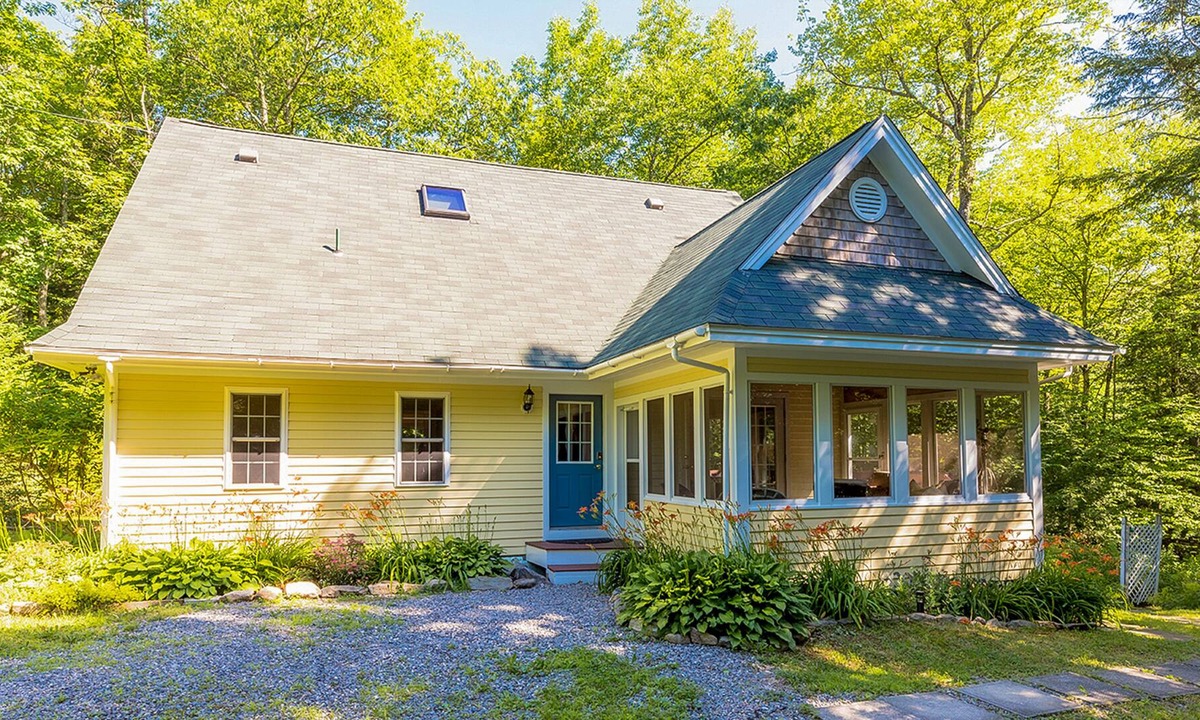 Eddington House | Water-view home with dock, fireplace, central AC & washer/dryer - dog-friendly