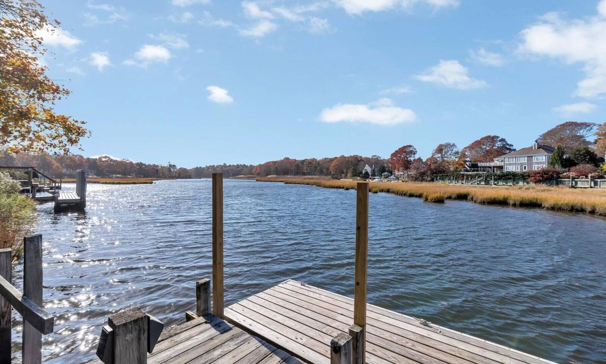 East Falmouth House | Waterfront Retreat with Private Dock and Fire Pit | Sleeps 8, Outdoor Dining, Spa-Style Primary, Chef’s Kitchen w/Dual Dishwashers, Gas Fireplace, River Views, Bright Open Layout, Central A/C, Perfect Coastal Escape for Families, 24 Hr Hospitality