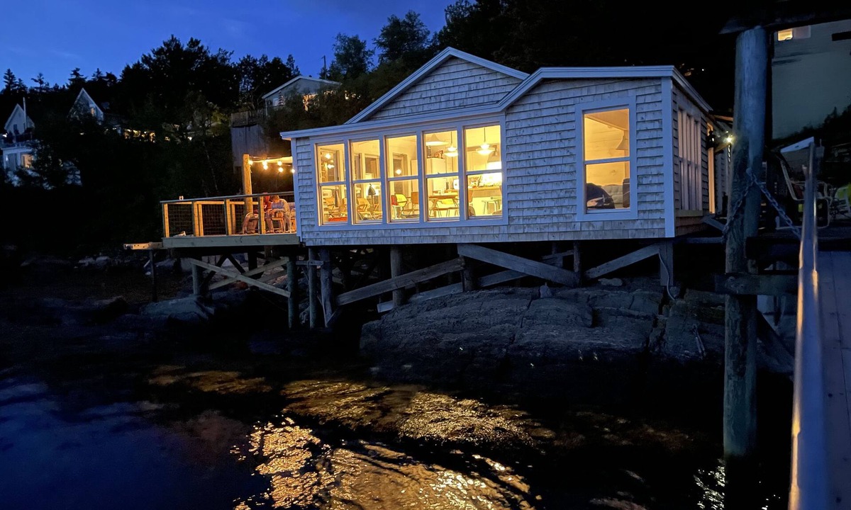 Georgetown Cottage | Waterfront, west facing, modernized fisherman’s cottage perched on the water.