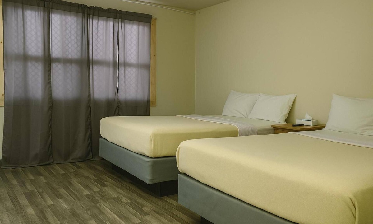 Wolf Point Hotel | Well-Equipped Classic Room Ideal for Families Traveling | Free Parking