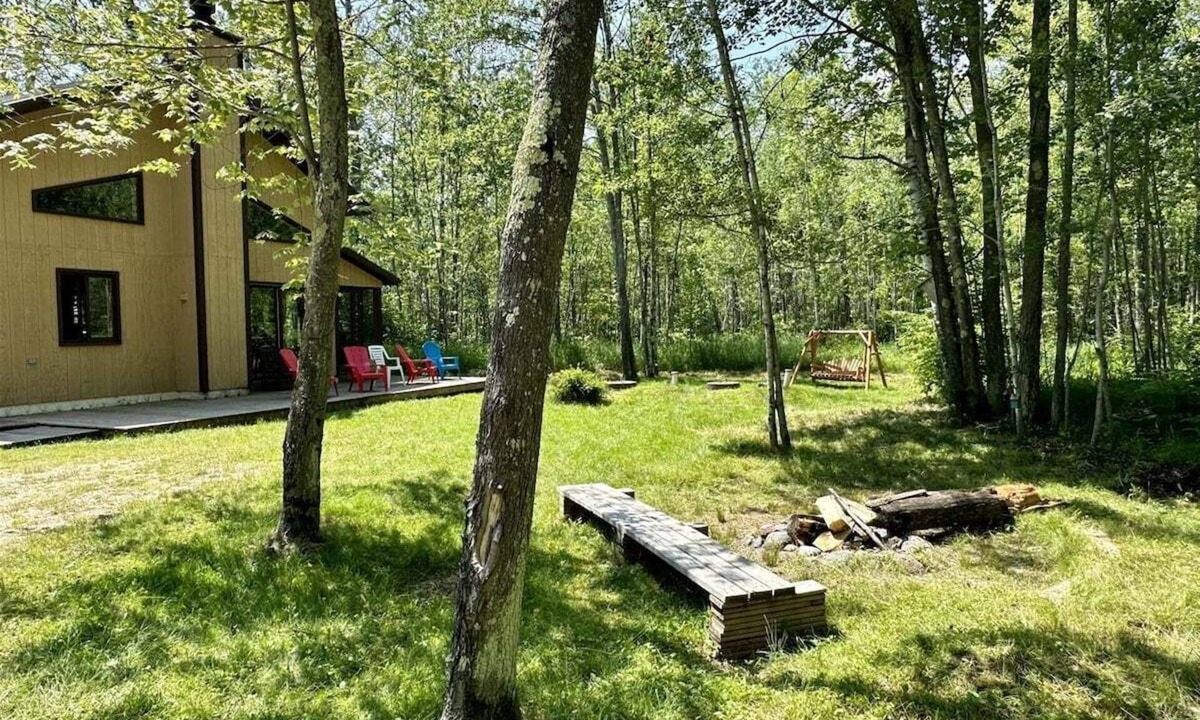 La Pointe House | Wilderness Retreat Cottage Tucked in the Woods