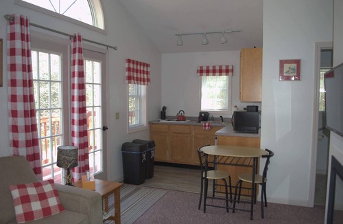 Norway Cabin | 1 bedroom cottage with queen bed and whirlpool tub and large raised deck.
