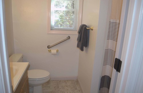 Norway Cabin | 1 bedroom cottage with queen bed and whirlpool tub and large raised deck.