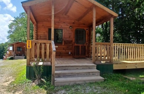Logan Cabin | 118) Teal Log Cabin. Close to Hocking Hills State Park and more!