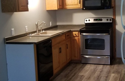 Nevis House | 2 Bedroom apartment upstairs with laundry .