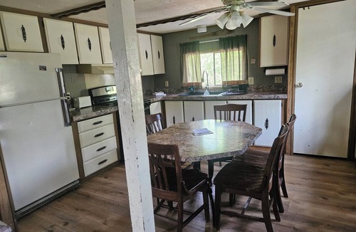 Baudette House | 2 BR mobile home with AC that includes dock slip on the Rainy River. Sleeps 8