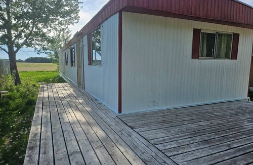 Baudette House | 2 BR mobile home with AC that includes dock slip on the Rainy River. Sleeps 8