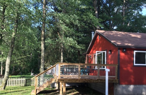 Baldwin Cottage | 2 cottages on Whalen lake/ Baldwin MI Sleeps 12. Steps from sandy beach