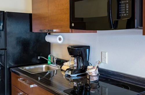 Sioux Falls Hotel | 2 Units | w/Kitchenettes | Near Wild Water West Waterpark