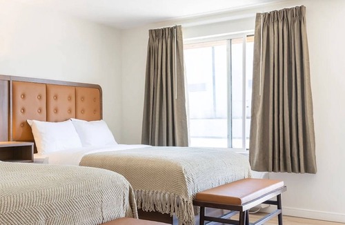 Talbot's Corner Hotel | 2 Welcoming East Nashville Rooms near Ryman Auditorium | Pool Access!