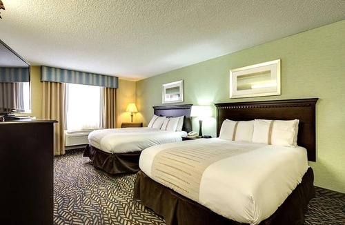 Devils Lake Hotel | 2 Welcoming Rooms Near Historic Fort Totten | Pet Friendly, Free Parking, Pool
